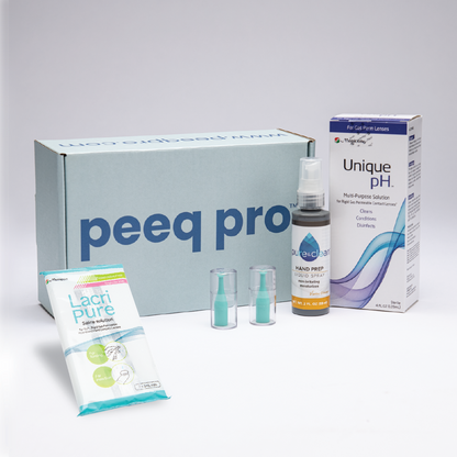 Peeq Pro Scleral Box, containing LacriPure, Unique pH, Pure&Clean Hand Prep Liquid Spray, and two eye plungers.
