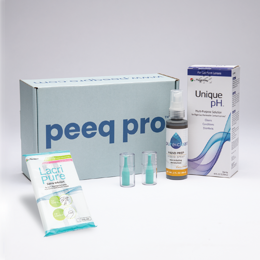 Peeq Pro Scleral Box, containing LacriPure, Unique pH, Pure&Clean Hand Prep Liquid Spray, and two eye plungers.